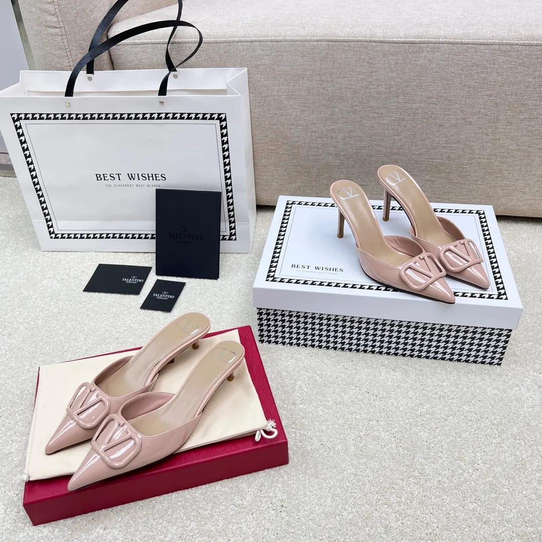 💕💕Factory direct selling price p500💕💕 VALENTINO latest V Logo buckle back empty slippers🔥🔥🔥 🕳️🕳️🕳️ Exclusive original 1-1 development, no goods without the original 〰 ɪɴлᴏʀᴍᴀᴛɪᴏɴ 〰 Buckle: V-LoGo leather buckle Material: imported patent leather Lining: full-grain sheepskin Outsole: Italian dyed cowhide Midsole: Italian original craft material Process: computer stitching, machine shaping Heel height: 4.0/8cm Made in Italy 🇮🇹 Ready stock code: 35 36 37 38 39 Ready stock Customized code: 34 40 41 Shipping time is 1-3 days, non-refundable